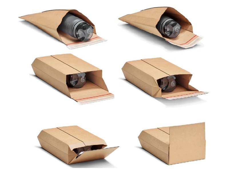 Cardboard-wrapped book on a conveyor belt